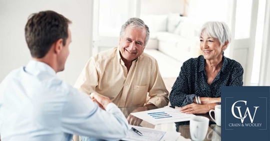 Older Couple Talking to Attorney